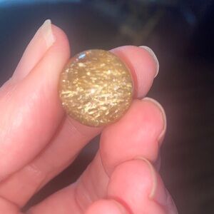 Gorgeous golden rutile sphere